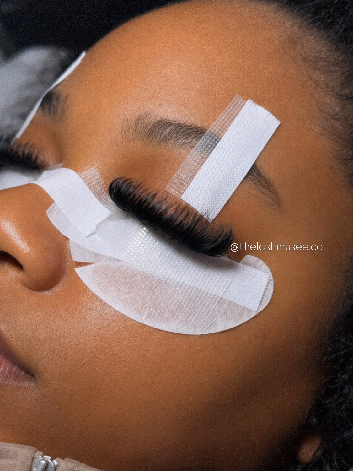 Precision lash application with protective tape